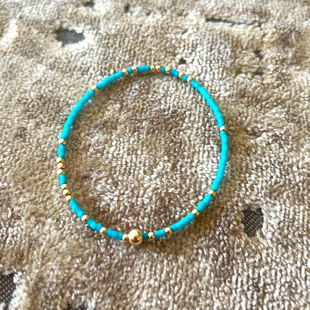 Super cute real gold enewton bracelet